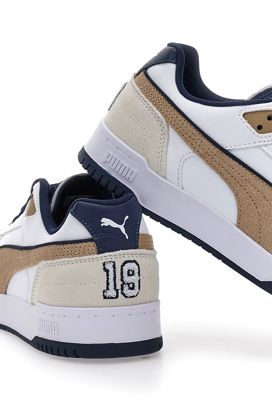 Sneakers bianche con dettagli blu e oro Puma RBD Game Low Retro Club